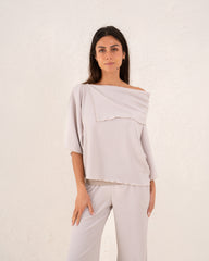 Women loose asymetric top