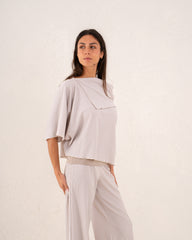 Women loose asymetric top