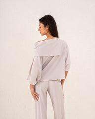 Women loose asymetric top