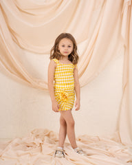 Girl checks flower skirt