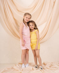 Girl checks flower skirt