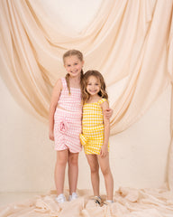 Girl checks flower skirt