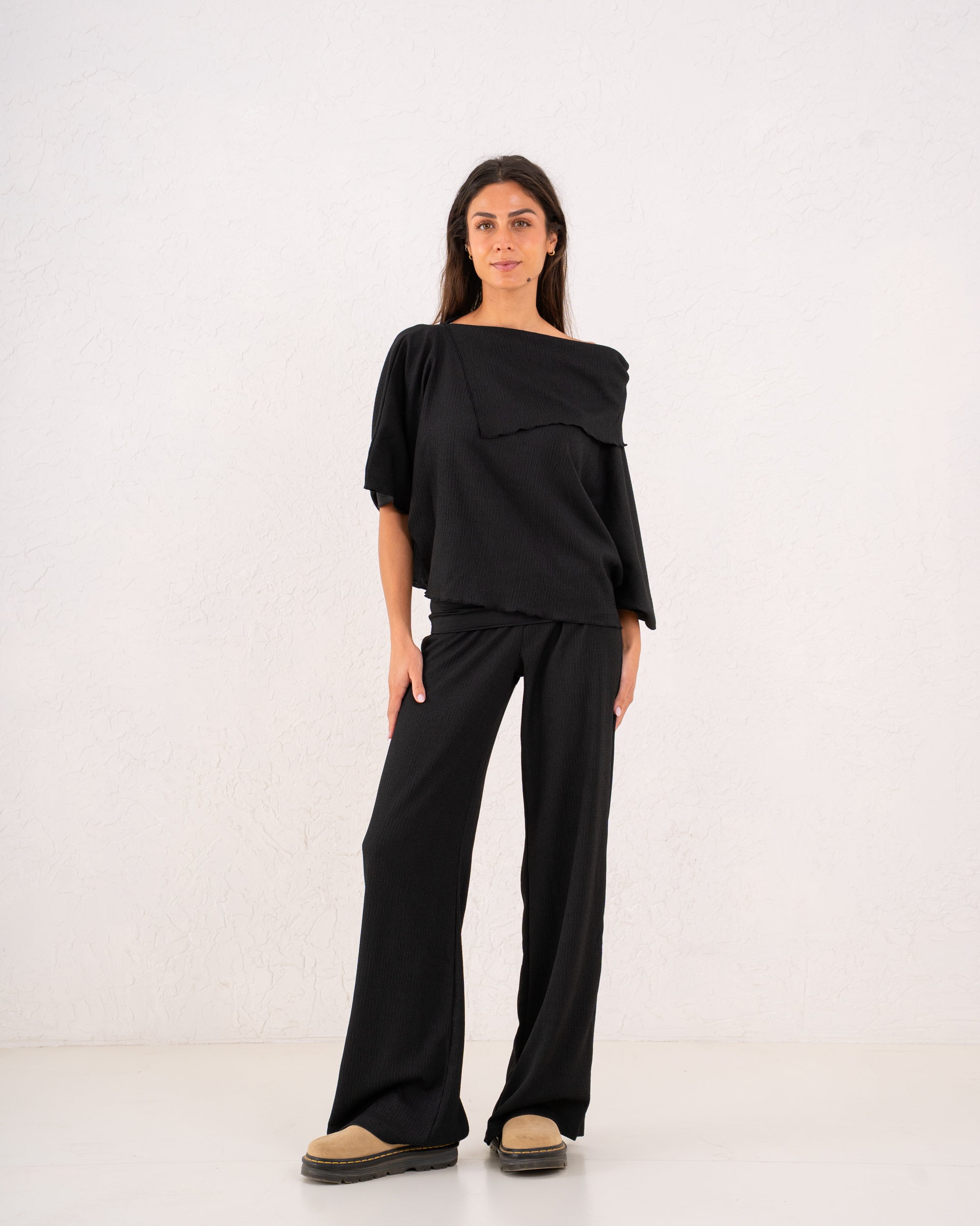 Women loose asymetric top