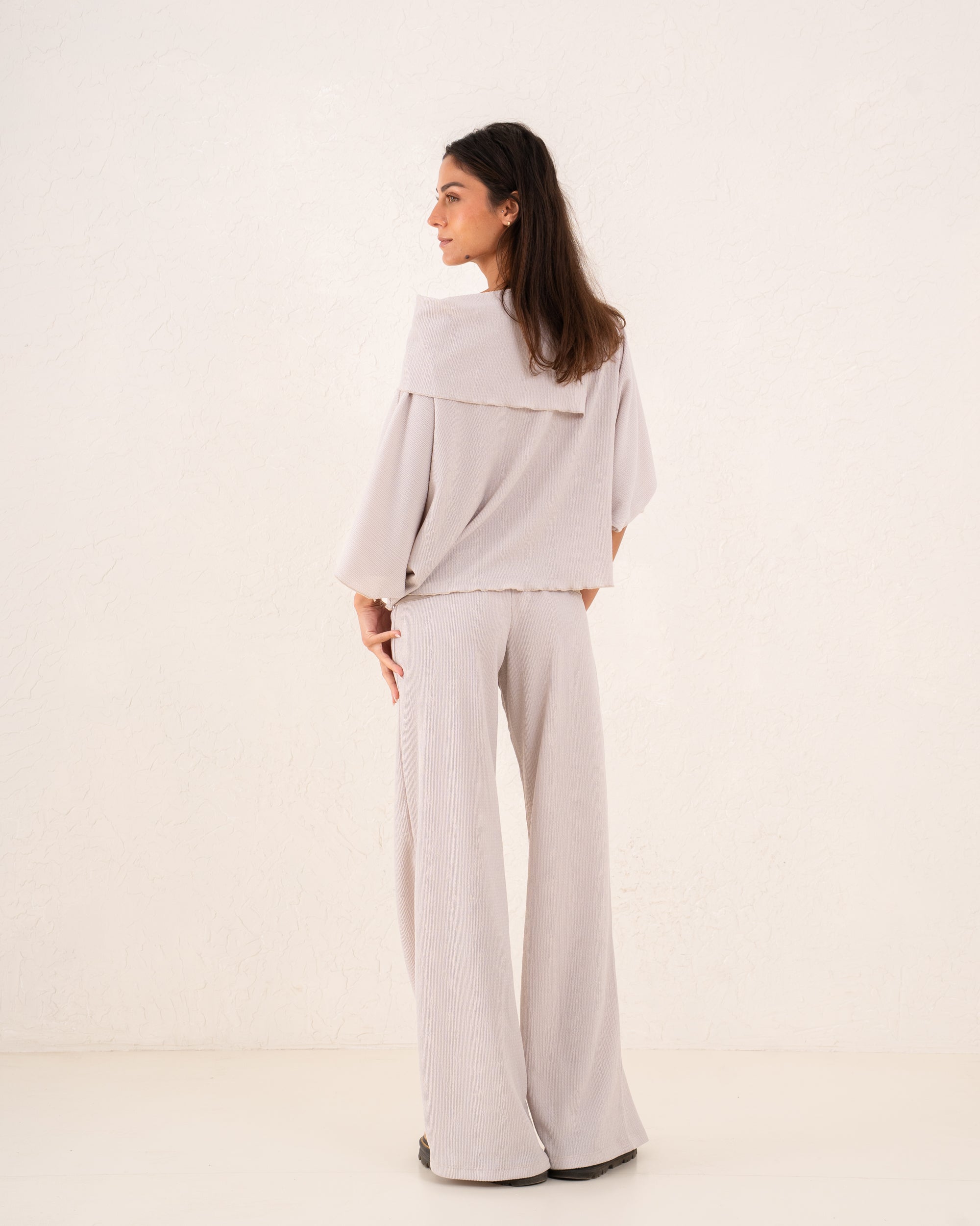 Women loose asymetric top