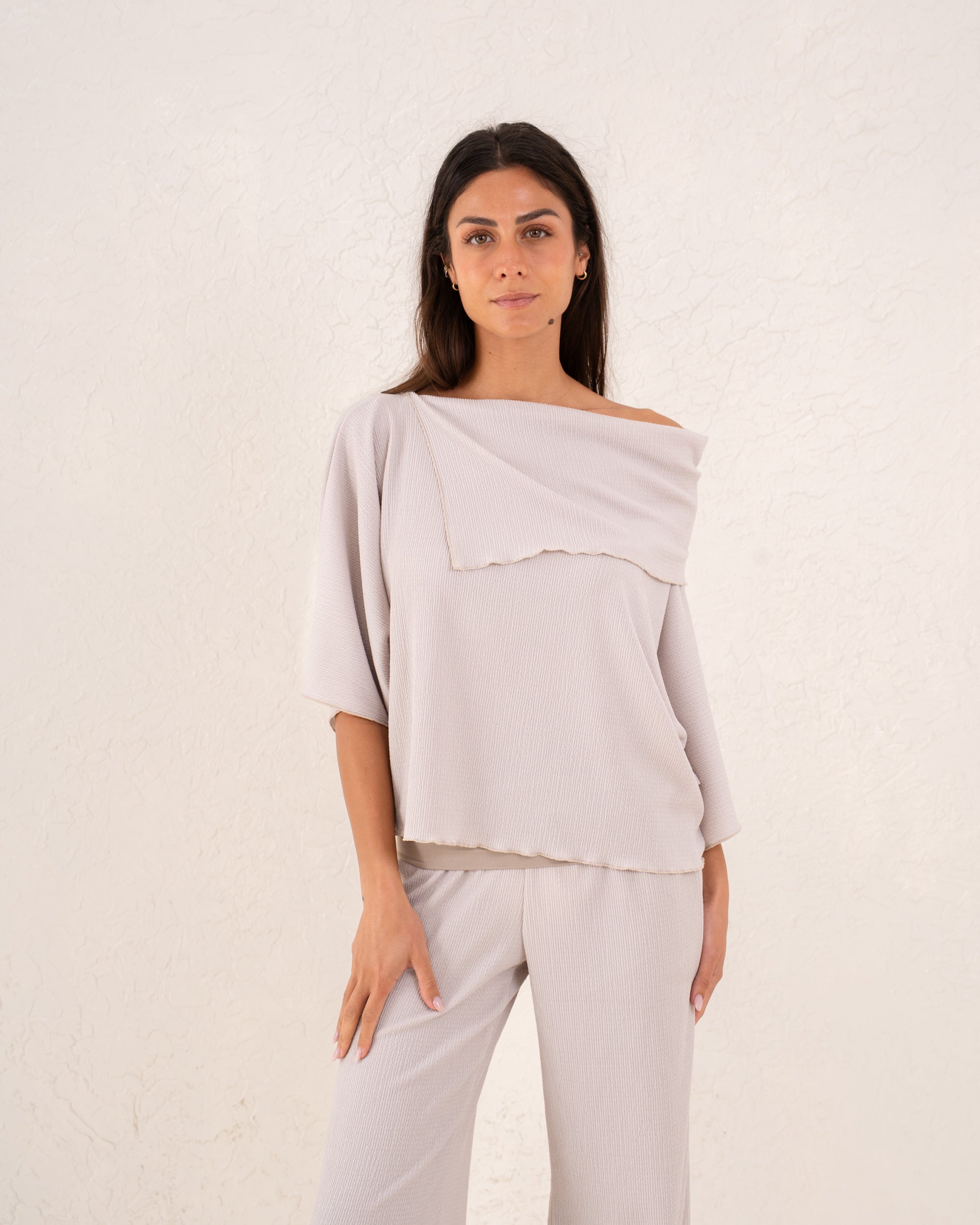 Women loose asymetric top