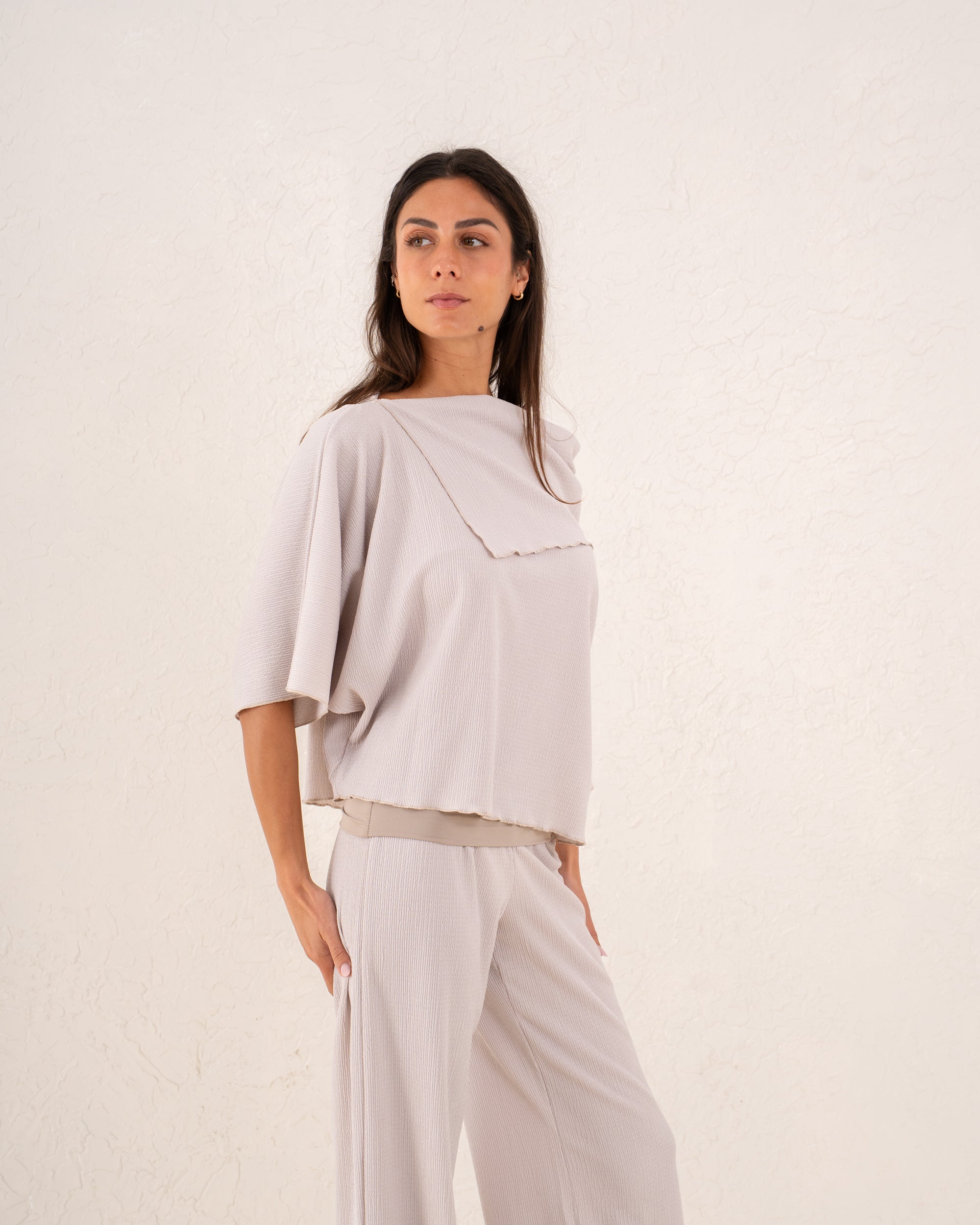 Women loose asymetric top