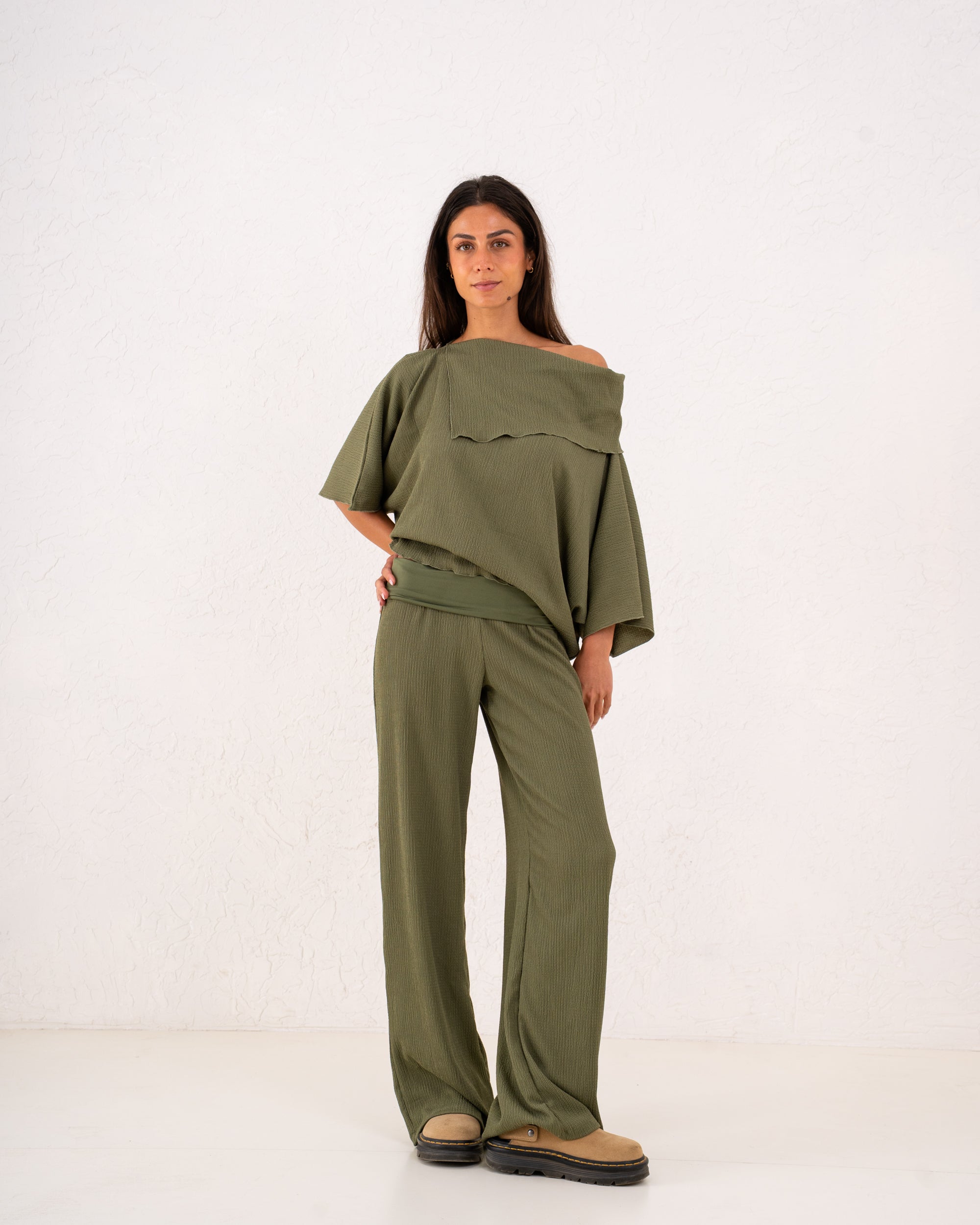 Women loose asymetric top