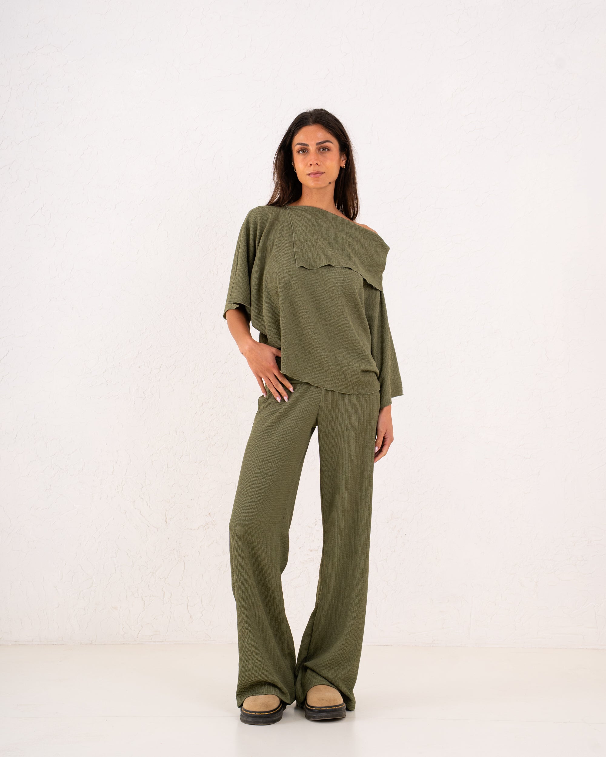 Women loose asymetric top