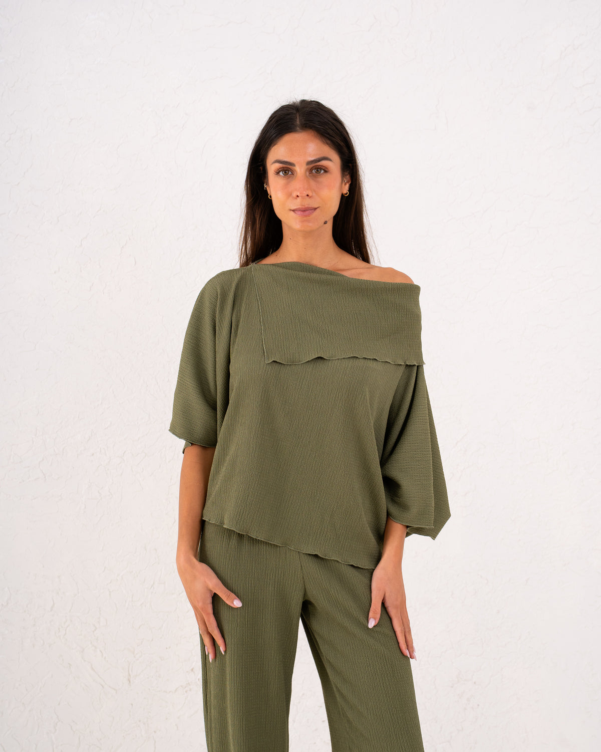 Women loose asymetric top