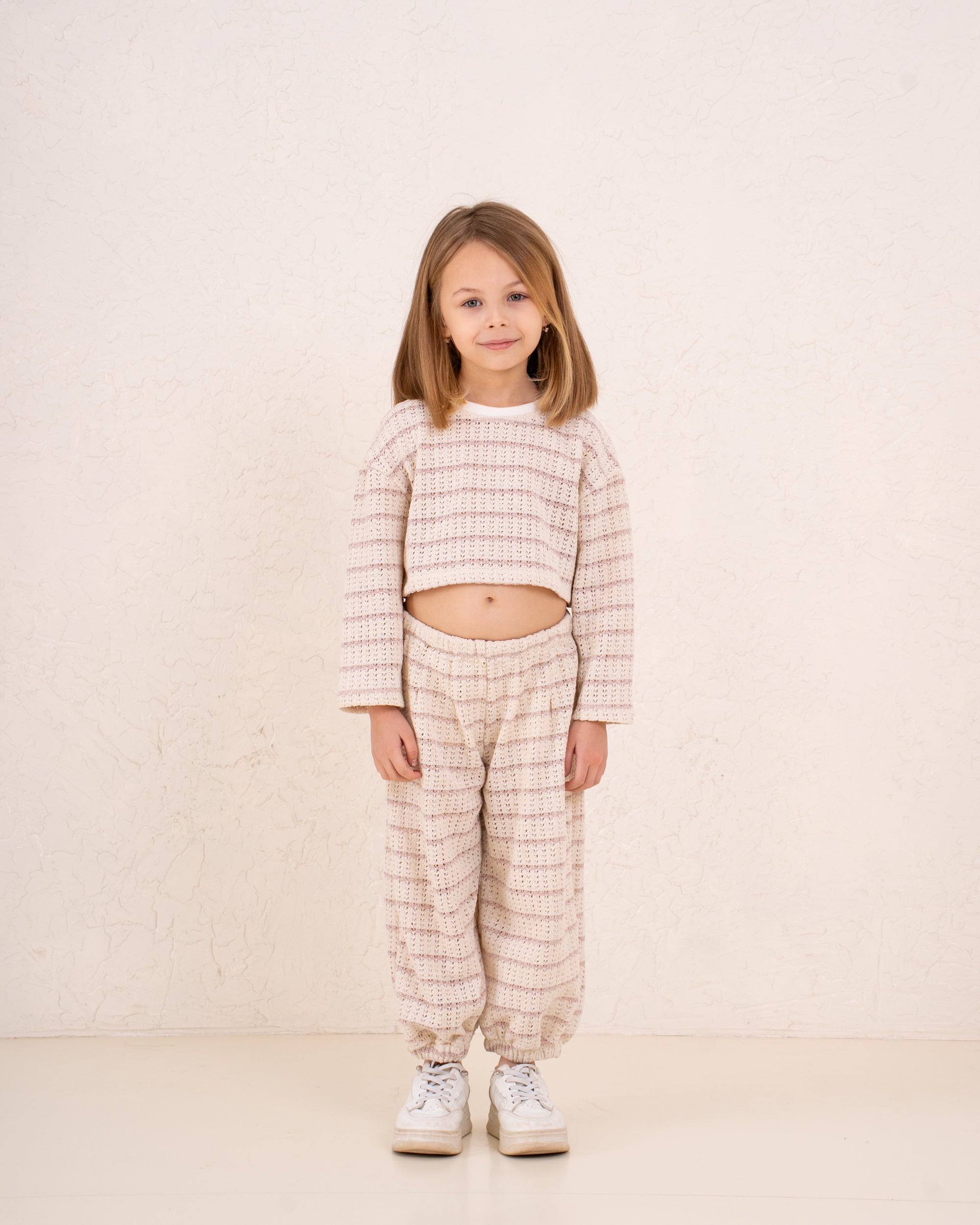 Girl knitted striped pullover