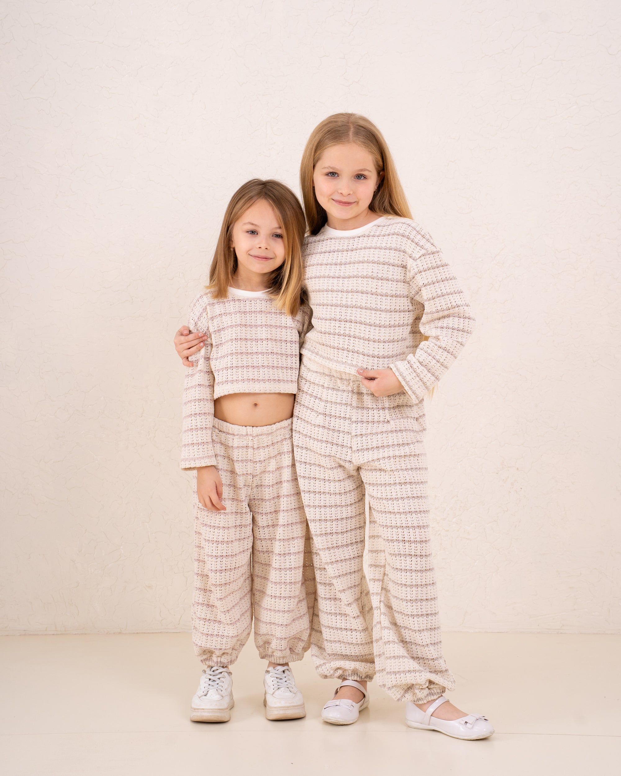 Girl knitted striped pullover