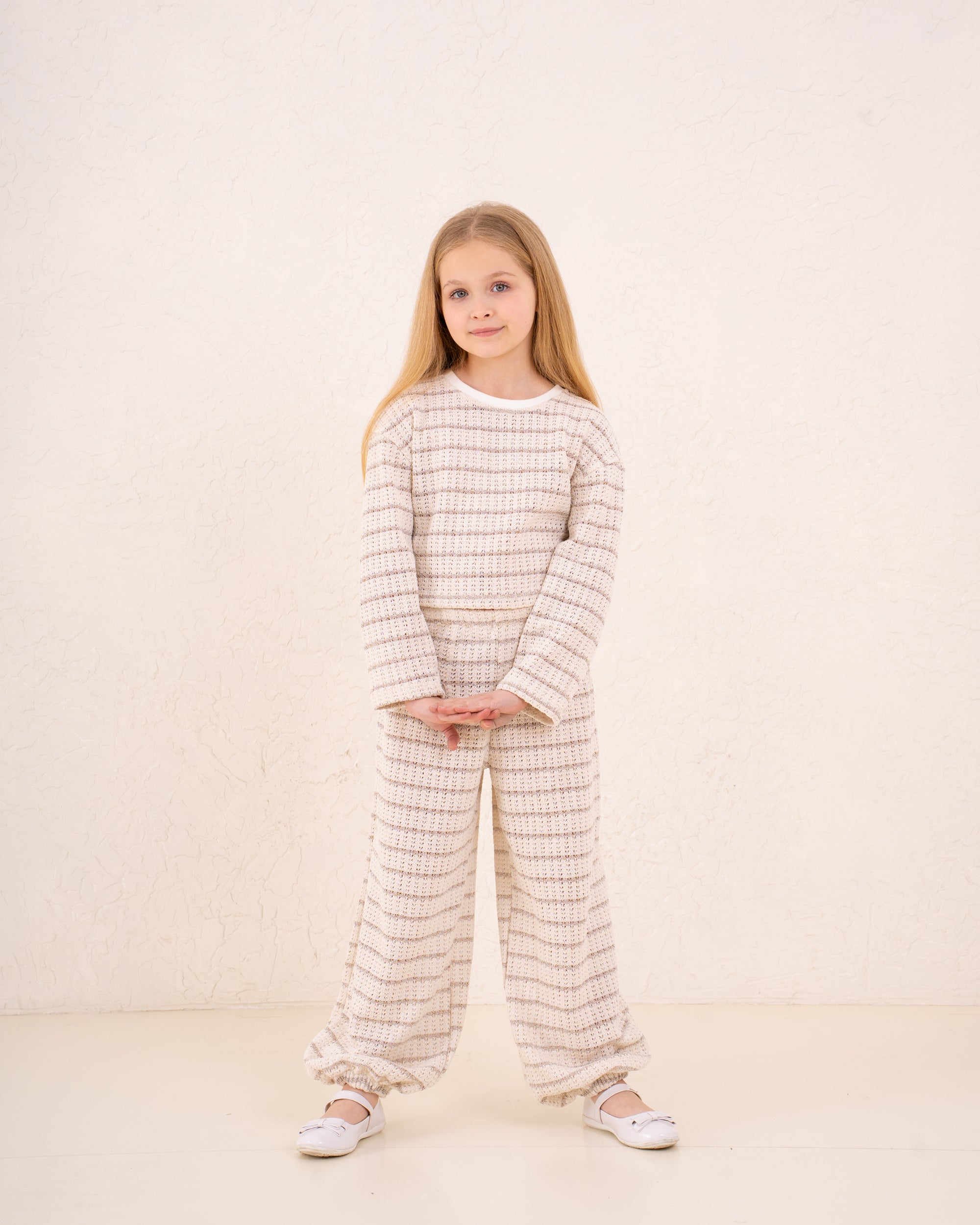 Girl knitted striped pullover