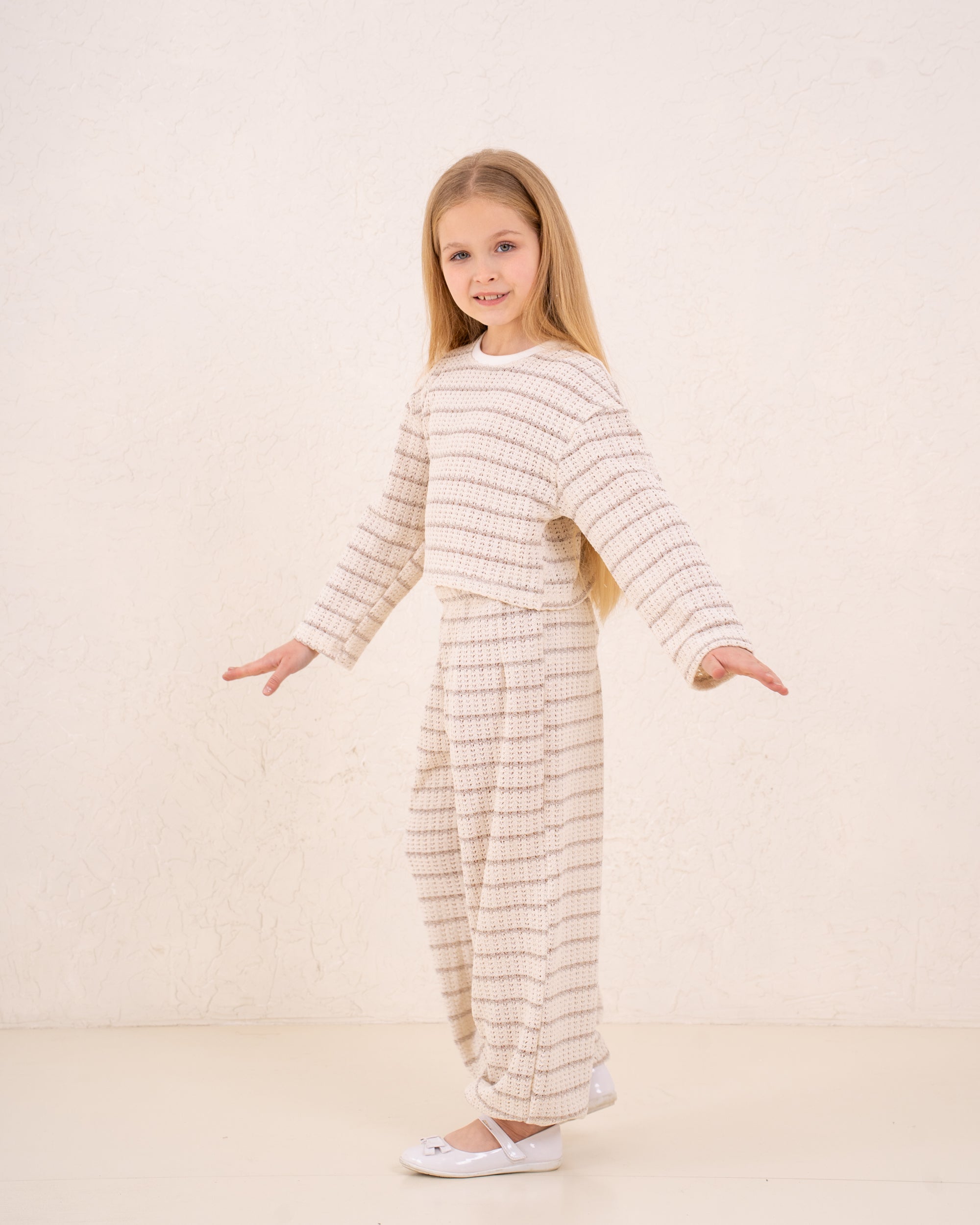 Girl knitted striped pullover