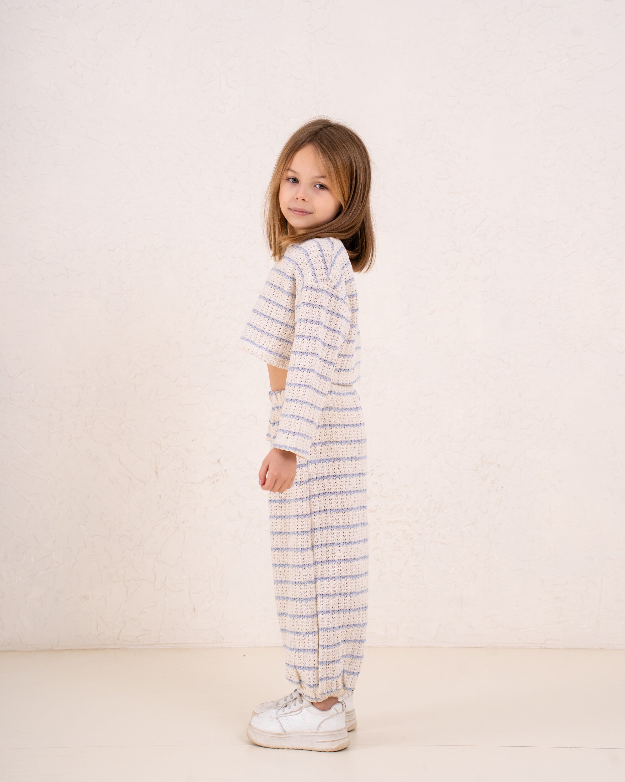 Girl knitted striped pullover