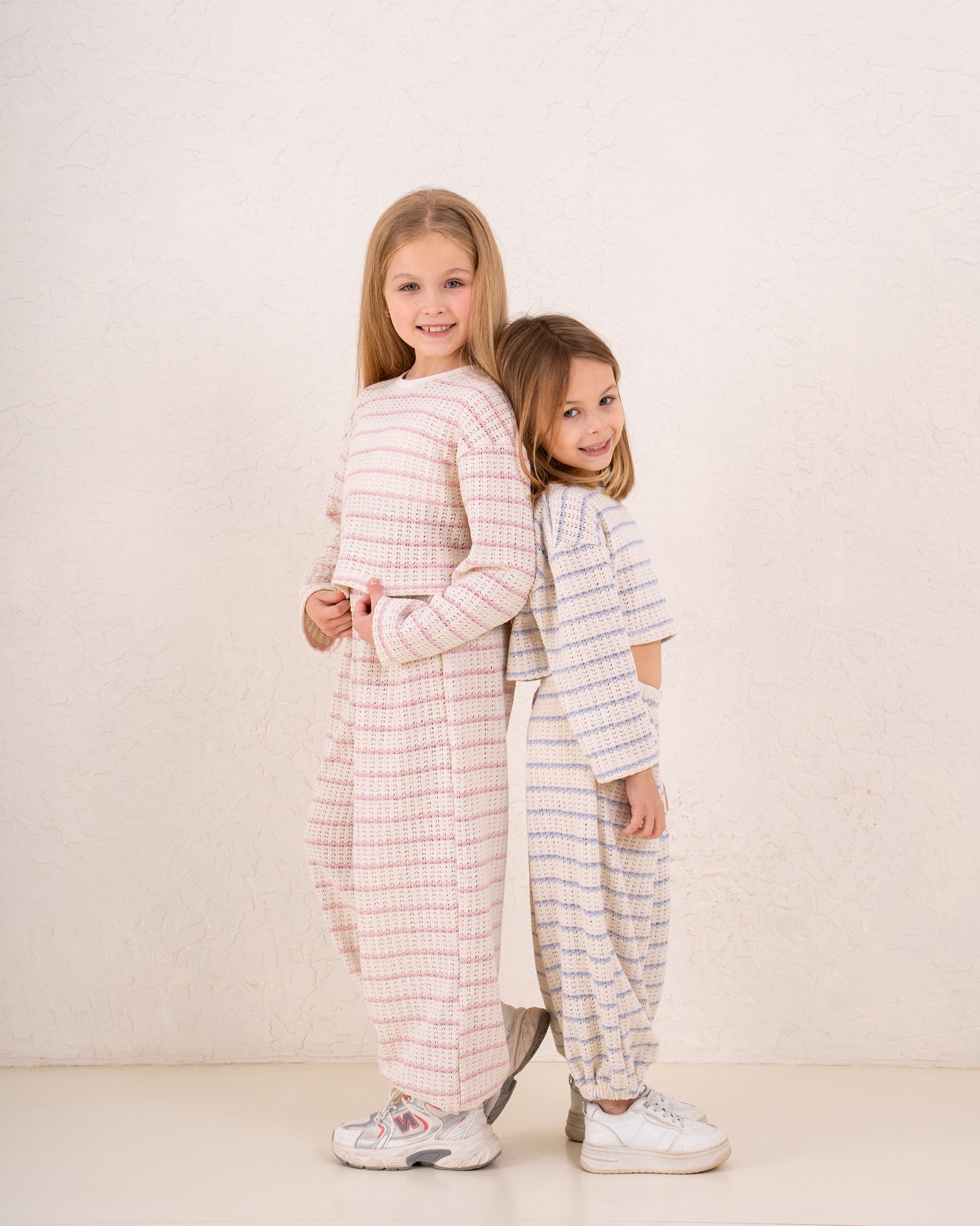 Girl knitted striped pullover