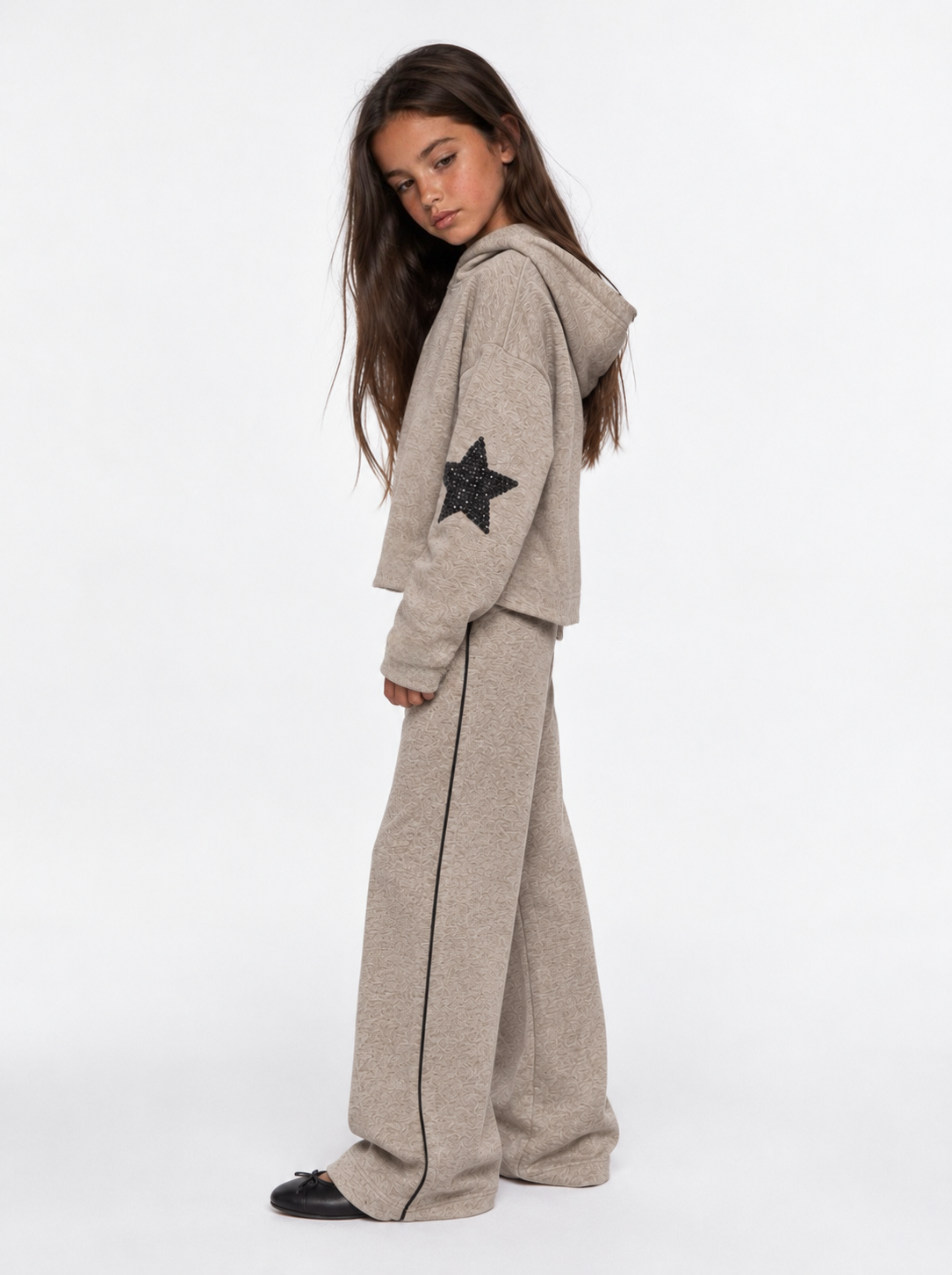 Girl star on sleeve sweater