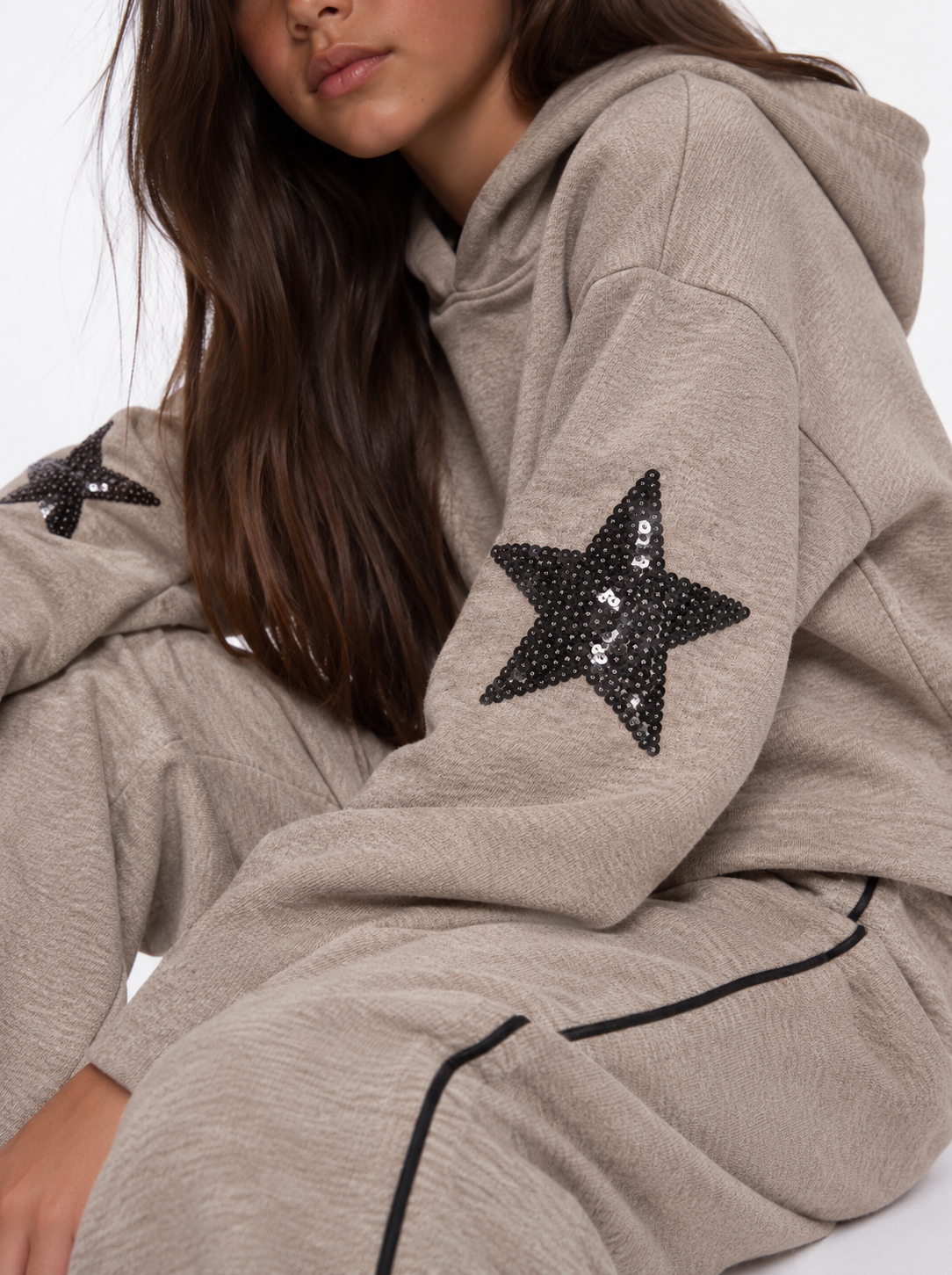 Girl star on sleeve sweater