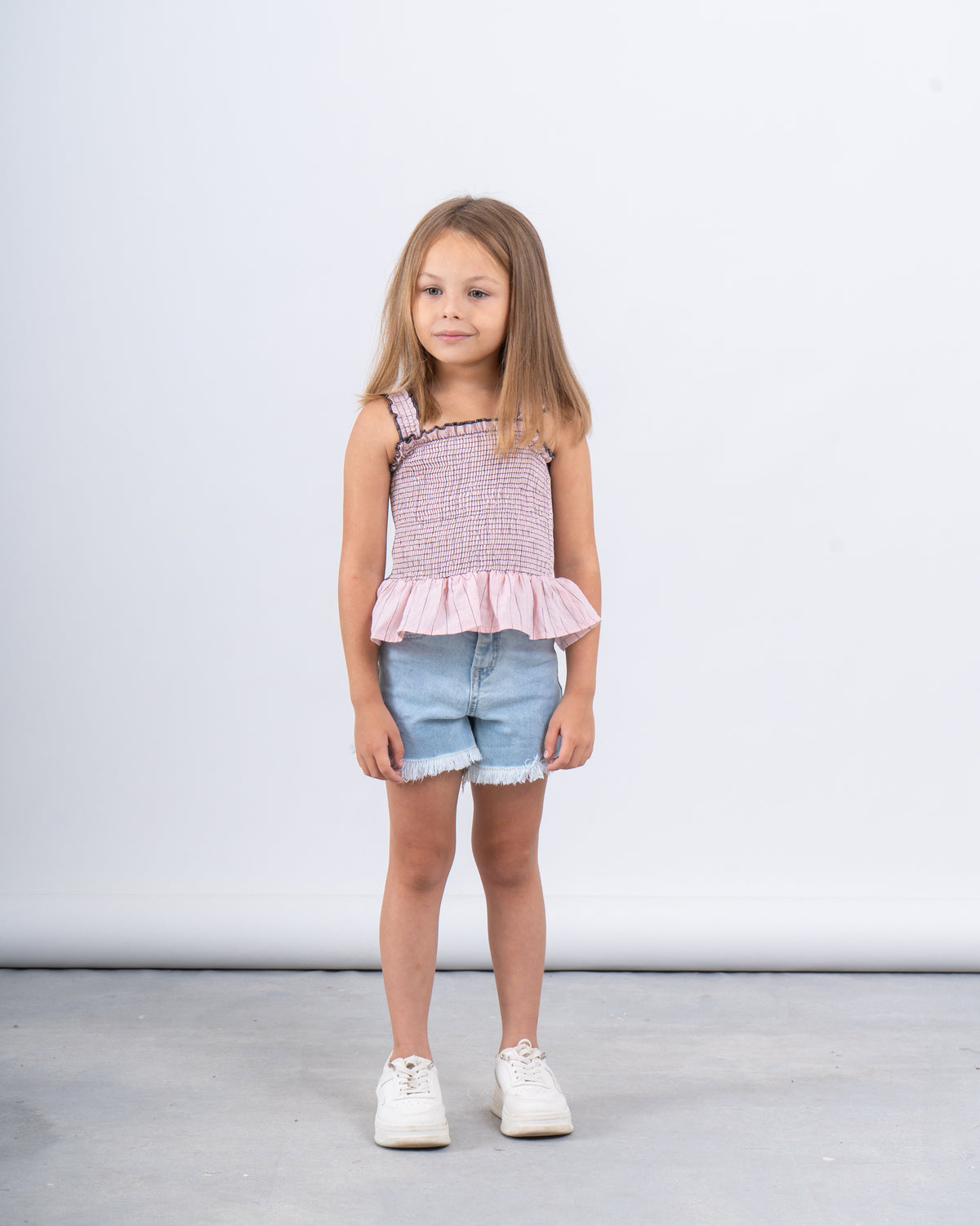 Smocked Peplum Strap Top