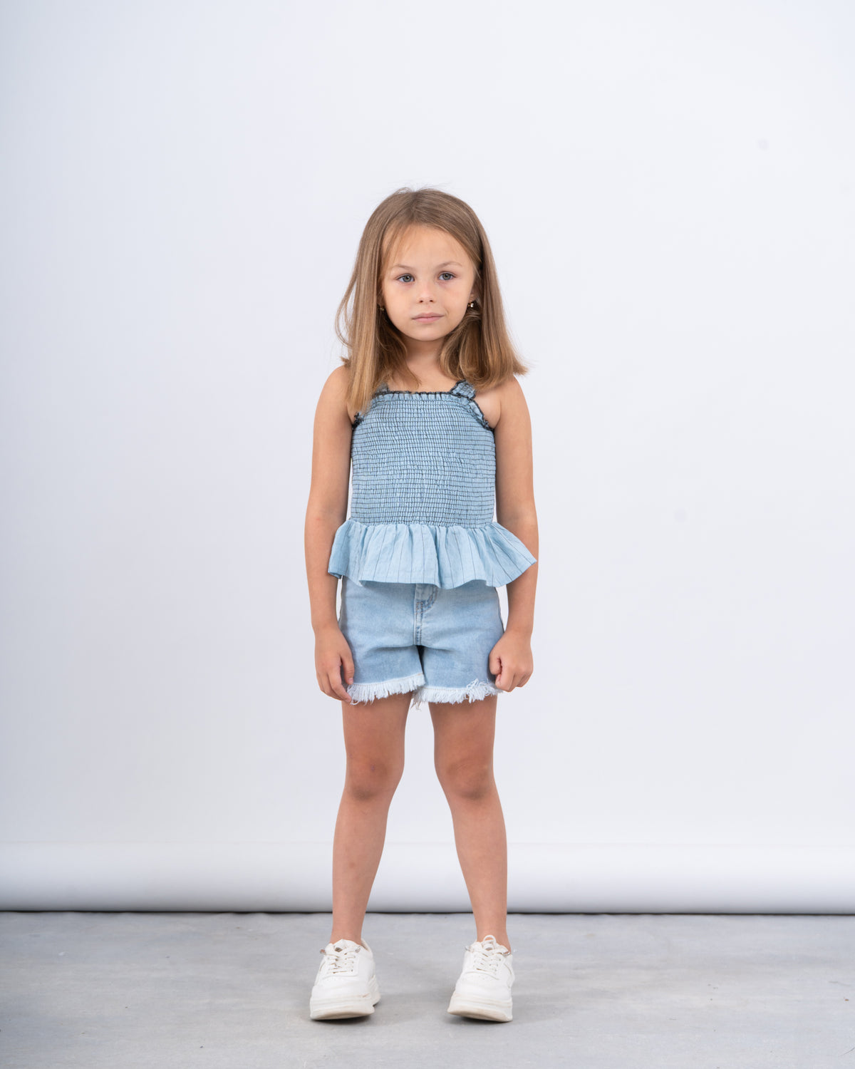 Smocked Peplum Strap Top