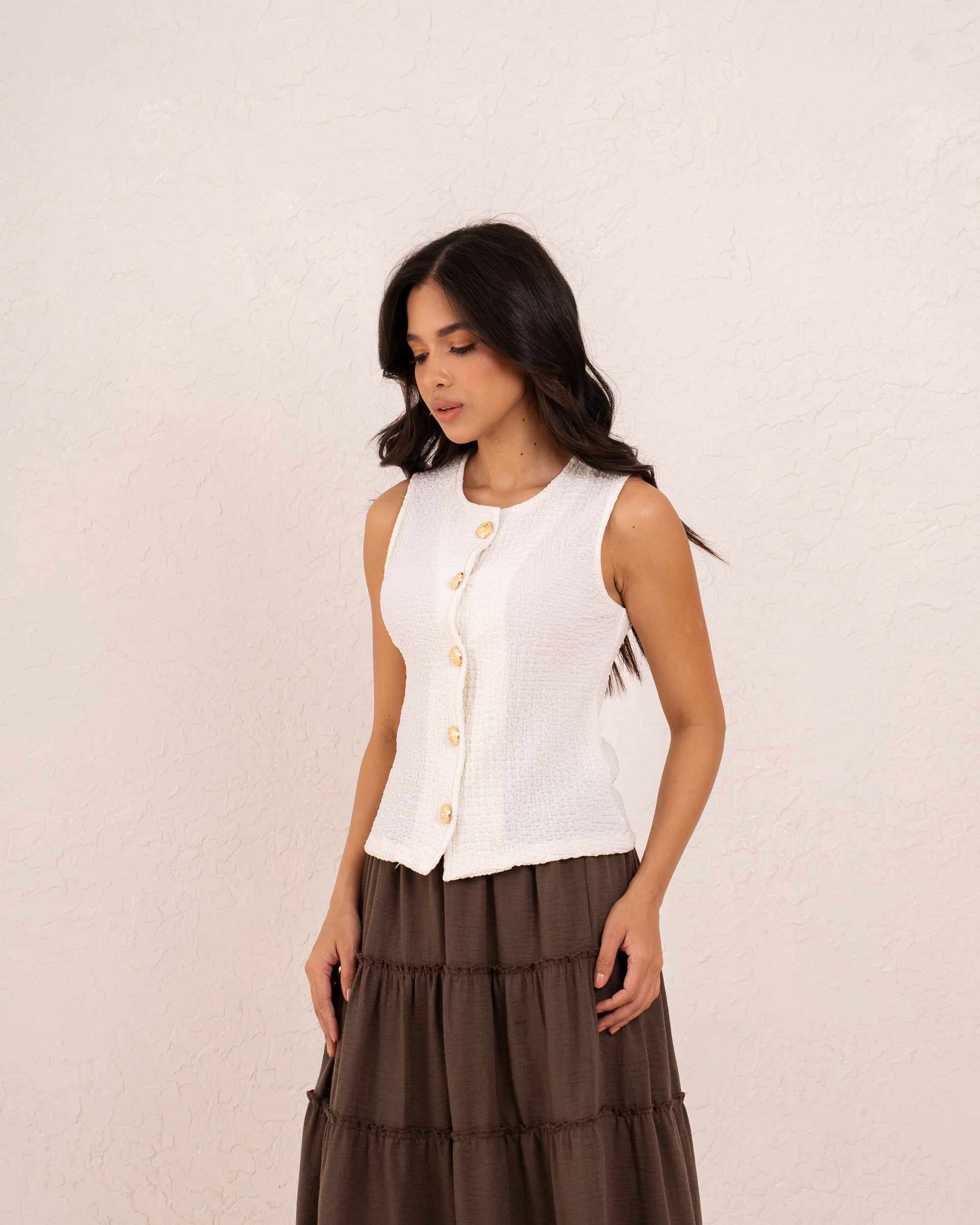 Women gold button textured