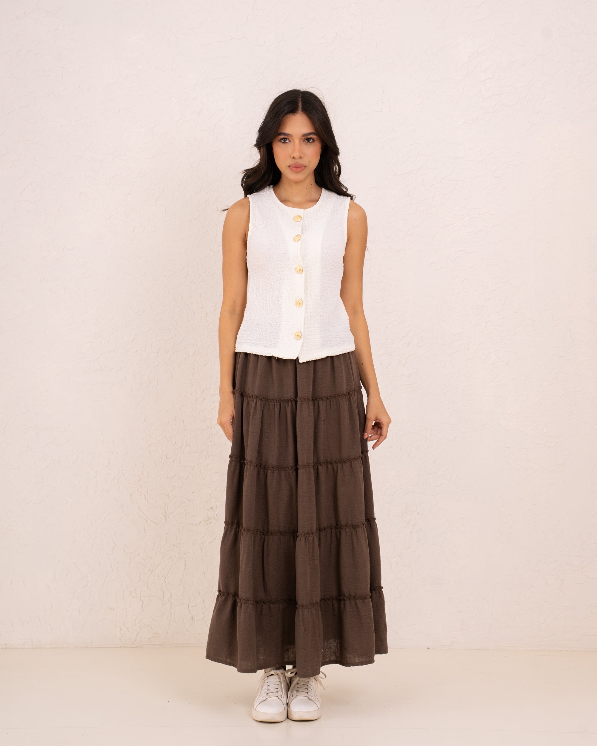 Women gold button textured