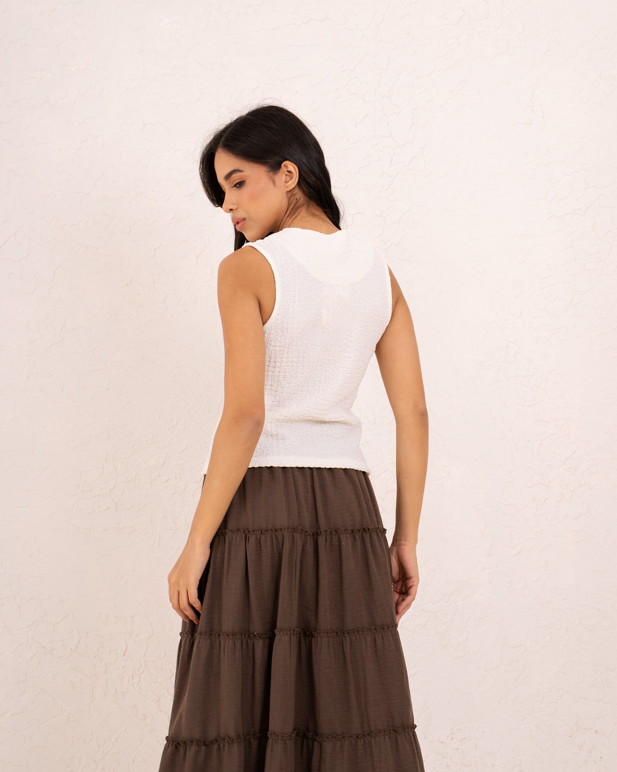 Women gold button textured