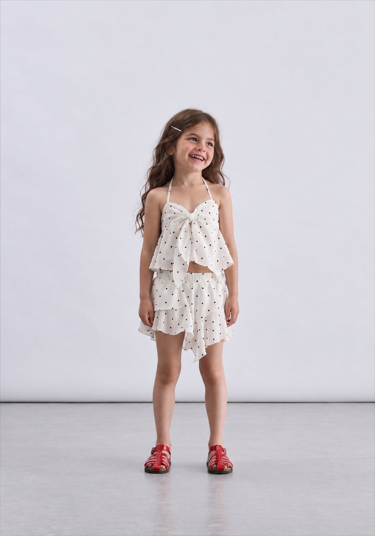 Girl high low polka dot skirt
