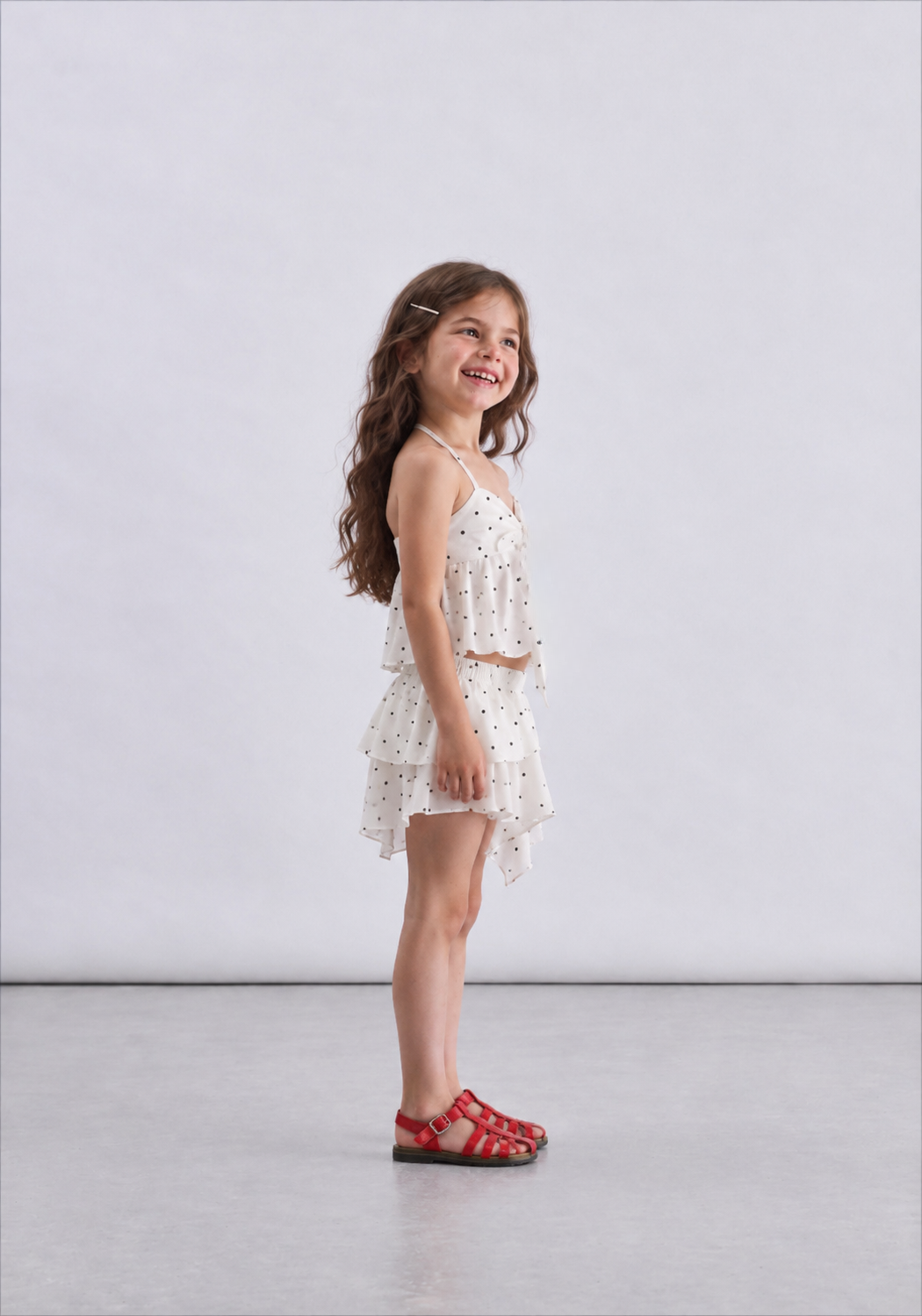 Girl high low polka dot skirt