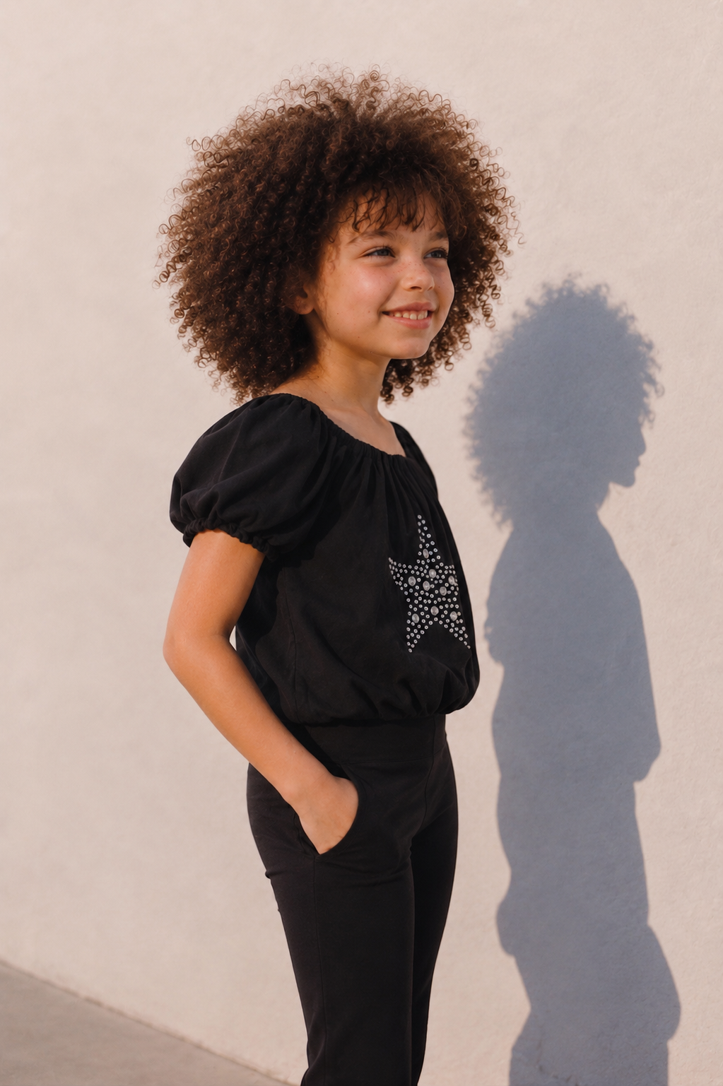 Girl puffball star top